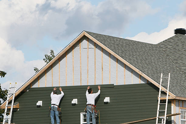 Professional Emergency Siding Repair technician working in Bainbridge, OH